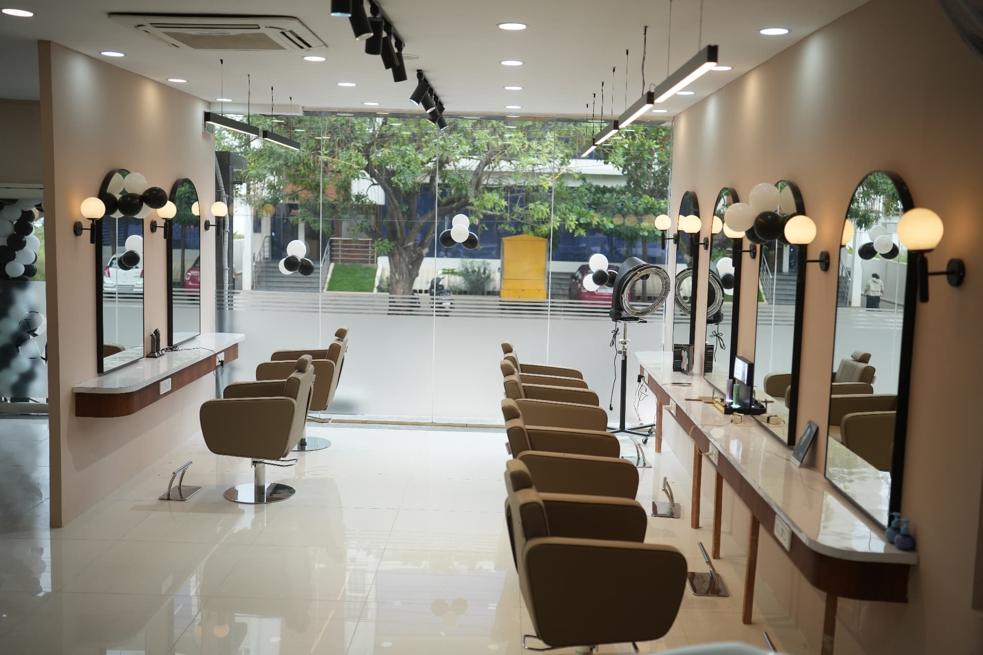 Styling stations with arched mirrors at Vibe Salon